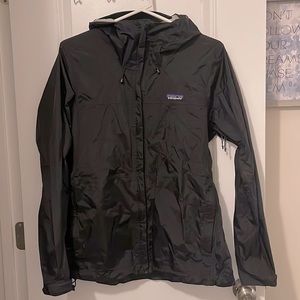 Black hooded Patagonia rain jacket
